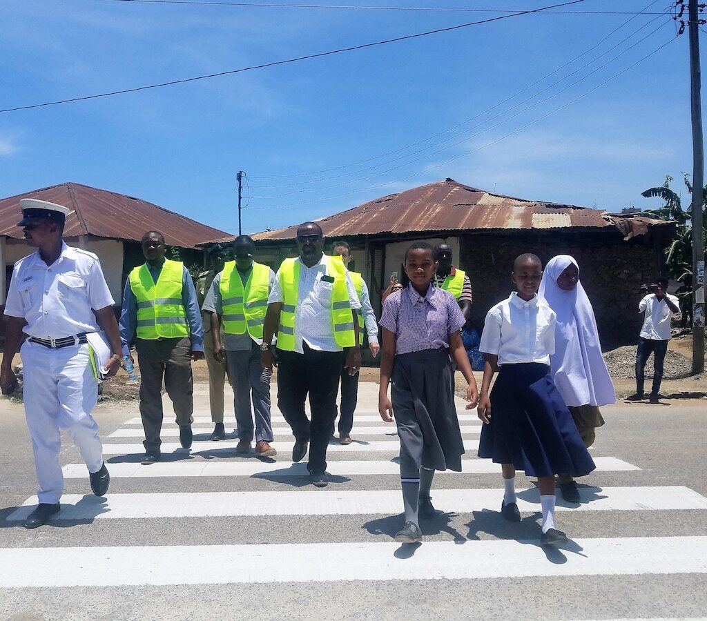 Event guests and students crossing with new infrastructure