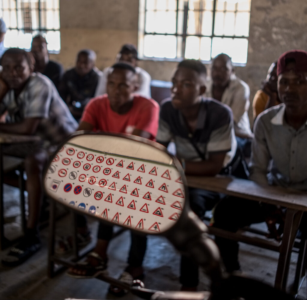 Commercial motorcycle riders in the theoretical, classroom part of the motorcycle training.