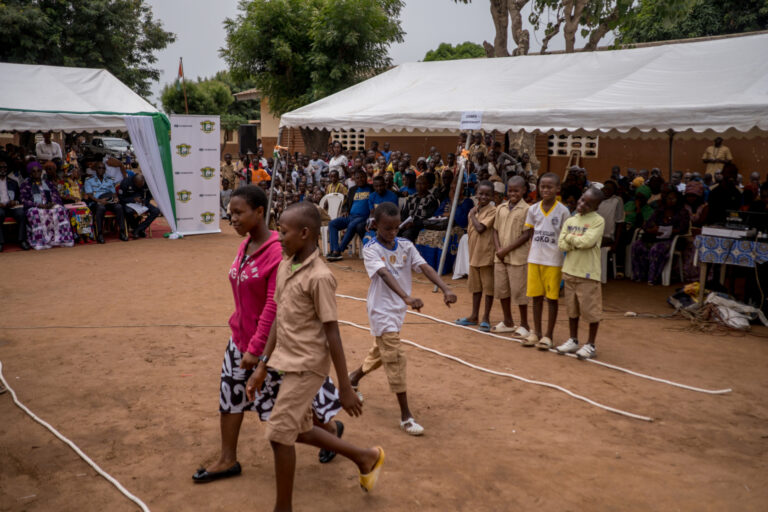 Ribbon-cutting event at the Koko primary school: road safety behavior demonstration